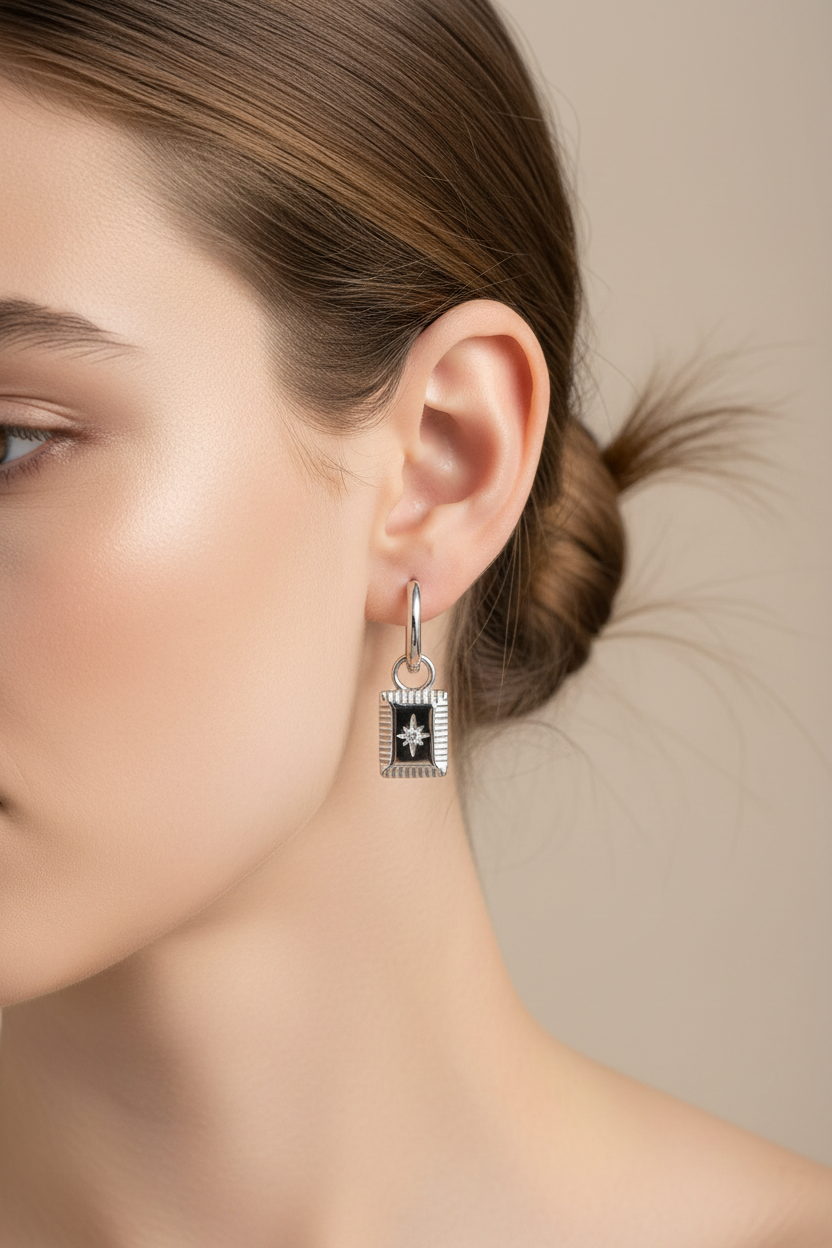 Silver star charm hoops on model